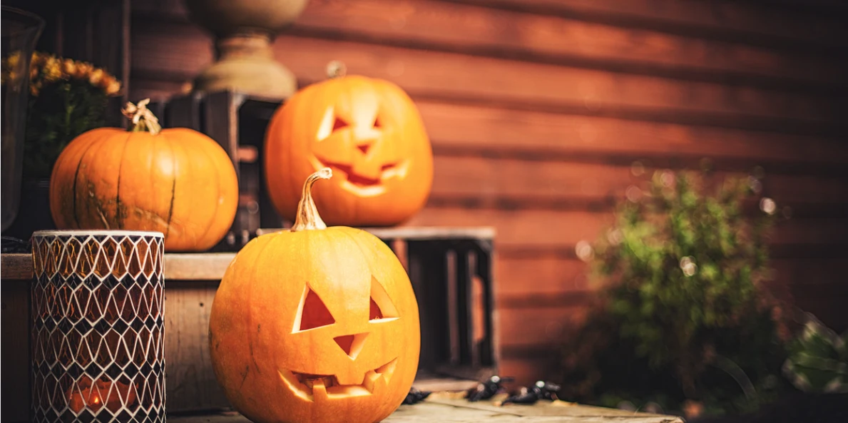 Carved pumpkins on porch